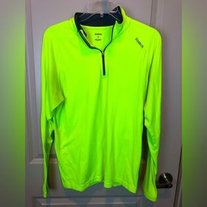 Bright yellow Reebok runners top